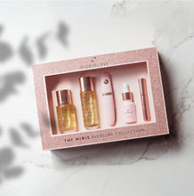 Load image into Gallery viewer, HighOnLove The Minis Pleasure Collection featuring a sensual massage oil, stimulating sensual oil, sensual bath oil, a plumping lip gloss, and a CalExotics mini wand vibrator.