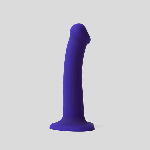 Blue silicone dildo with a wide base on a white background