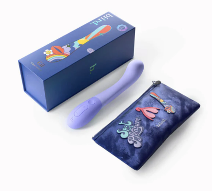 Rear view of Biird Gii Rechargeable G-Spot Vibrator in lilac and purple. Shown horizontal on a white background, alongside a decorated navy blue carry case, and packaging.