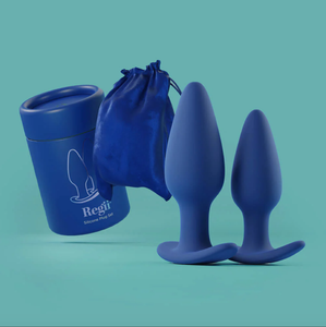 Photo of Biird Regii silicone butt plug set along with cardboard packaging and blue velvet pouch