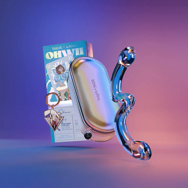 Biird Ohwii Luxury Glass Double Dildo hovering above a multicoloured background with a silvery case and Biird Ohwii packaging.