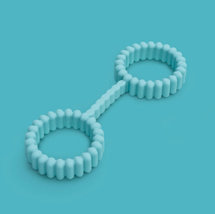 Biird Silicone handcuffs set against a sky blue background