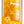 Side view of a Tenga Arte Weave in its packaging, yellow/orange theme