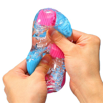 Hands holding up a multicoloured Tenga Bobble Masturbation Sleeve.