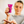 A slightly blurred menopausal woman squeezes a purple bottle of Yes VM vaginal moisturizer into her hand.