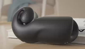 Video of the Snail Vibe Evo in black shows how this men's sex toy unrolls it's spiral heal with each stroke. 