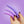 Woman's hands holding sizes 1-3 of the Skins Care silicone dilator set against a purple background.
