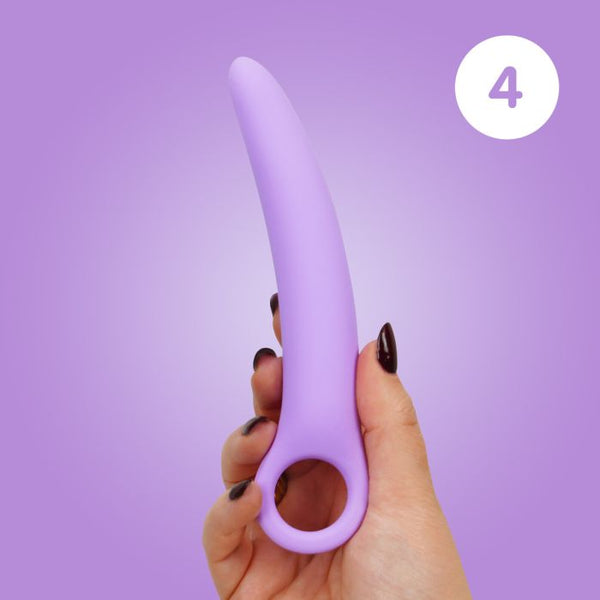 Woman's hand holding size 4 of the Skins Care silicone dilator set against a lilac background.