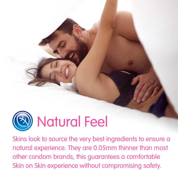 Advertisement for 'Natural Feel' condoms featuring a couple lying in bed.