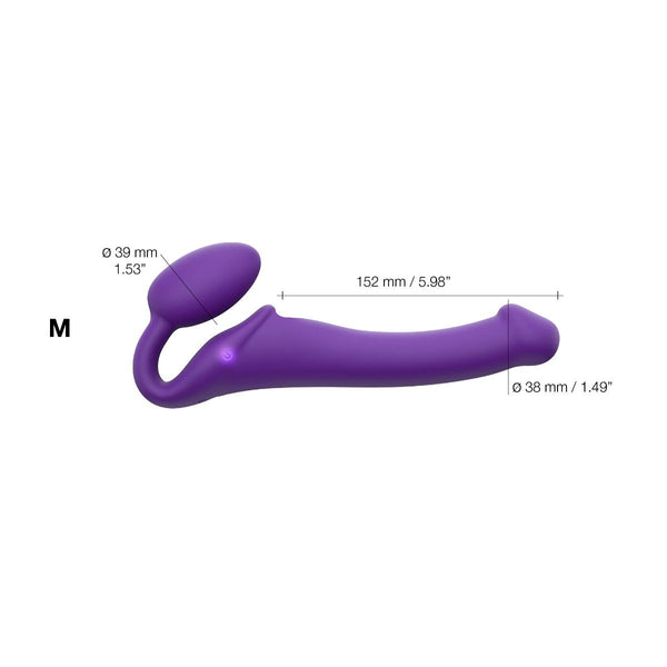 Purple vibrating strapless strap-on with measurements of length and diameter
