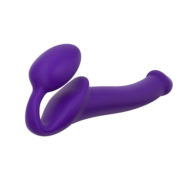 Purple silicone strapless strap on on a white background