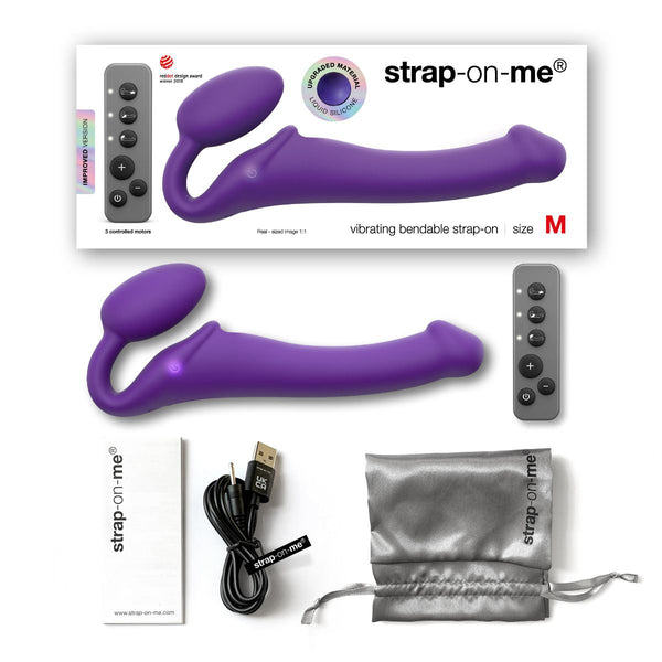 Purple vibrating bendable strap-on adult toy shown with its retail box, separate remote control, USB charging cable, booklet, and drawstring pouch on a white background.