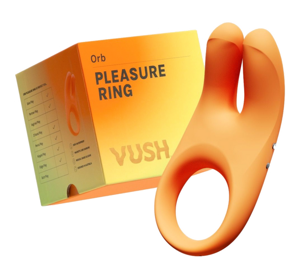 Vush Orb cock ring in Orange alongside its packaging.