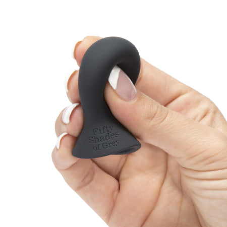 Hand squeezing the 100% silicone nipple suckers from 50 Shades of Grey