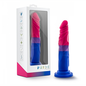 Two Avant Bisexual Pride flag silicone dildo with realistic head and suction cup base that's also strap-on harness compatible one dildo in packaging and one upright freestanding 