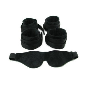 Kit of bondage equipment components in black on a white background.