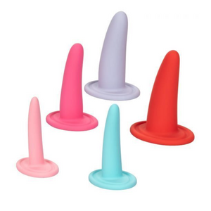 The Calexotics Sheology wearable silicone vaginal dilator set in pink, red, blue, and purple. Five dilators spread out on a white background - Sex Siopa, Ireland's best sex toys and accessories