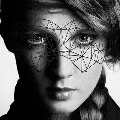 Black and white picture of a woman wearing a black Bijoux Indiscrets geometric mask - Sex Siopa Ireland