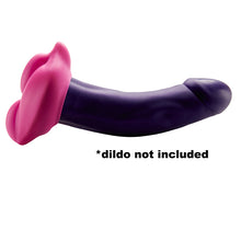 Load image into Gallery viewer, Side view of Bananapants Bumpher strap-on silicone cushion for comfort and clitoral stimulation. Modelled on a dildo to show how stretchy it is.