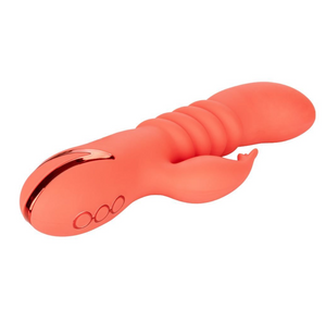 Side view of the Calexotics California Dreaming Orange County Cutie thrusting rabbit vibrator. This vibrator boasts 10 vibration settings and 3 thrusting speeds - Sex Siopa, Ireland's Best Sex Toys and Accessories
